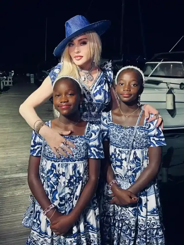 How many biological and adopted children does Madonna have?